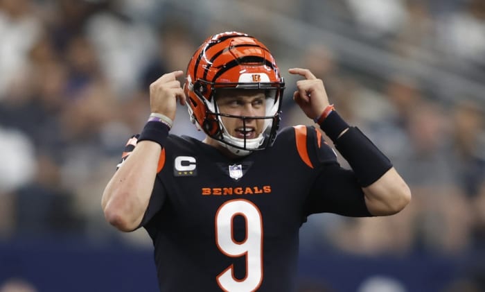 Sep 18, 2022; Arlington, Texas, USA; Cincinnati Bengals quarterback Joe Burrow (9) calls a play in the first quarter against the Dallas Cowboys at AT&T Stadium. Mandatory Credit: Tim Heitman-USA TODAY Sports